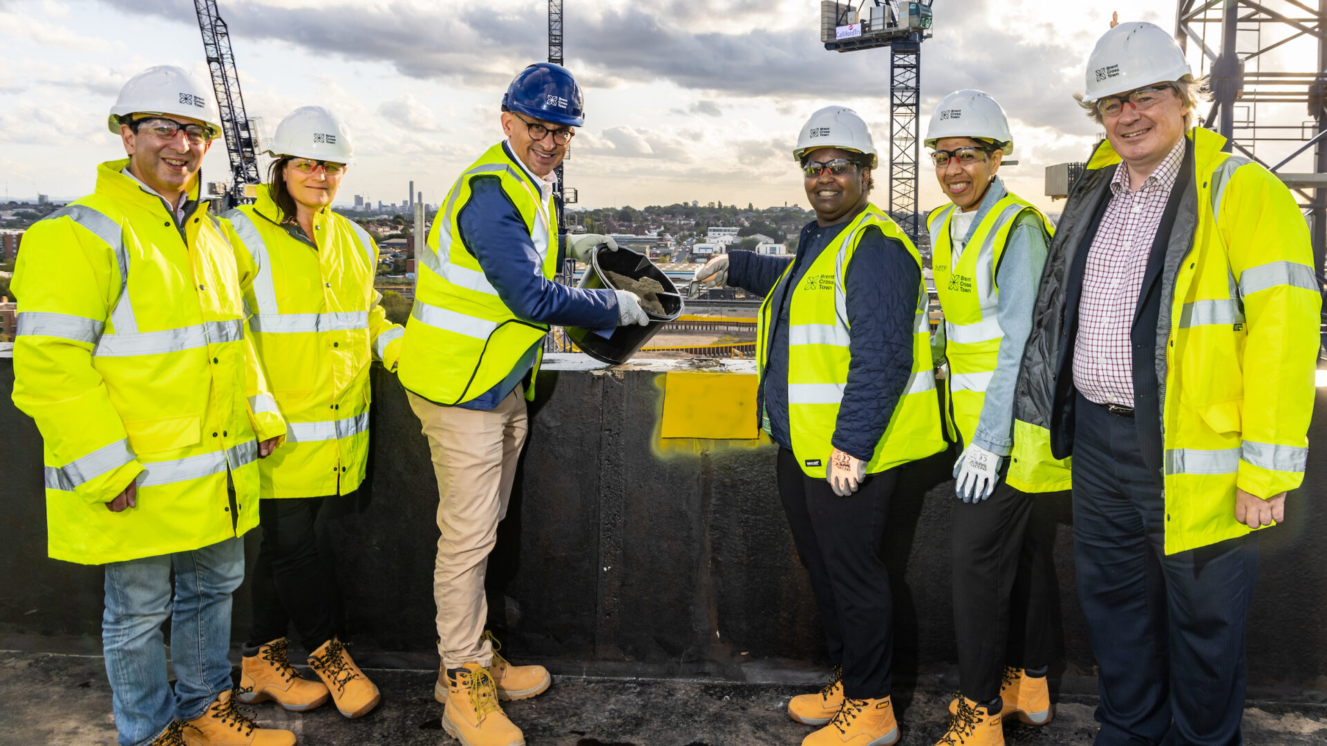 Topping Out for Plot 12, Brent Cross Town Left to Right: Cllr Schneiderman and Cllr Clarke, Barnet Council Andre Gibbs, Related Argent Gwen Gonzales, Whitefield Estate Resident Steering Group Natalie Stump, L&Q Cllr Ross Houston, Barnet Council