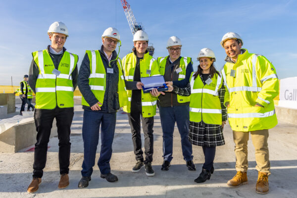Pictured l-r, Jamie Smith, Related Argent, Matthew Pool, MD Galliford Try, Oli Rifkind, Related Argent, John German, Invesco, Stacey Patten, Invesco and Jal Patel, ICG at the Topping Out of Plot 13, Brent Cross Town