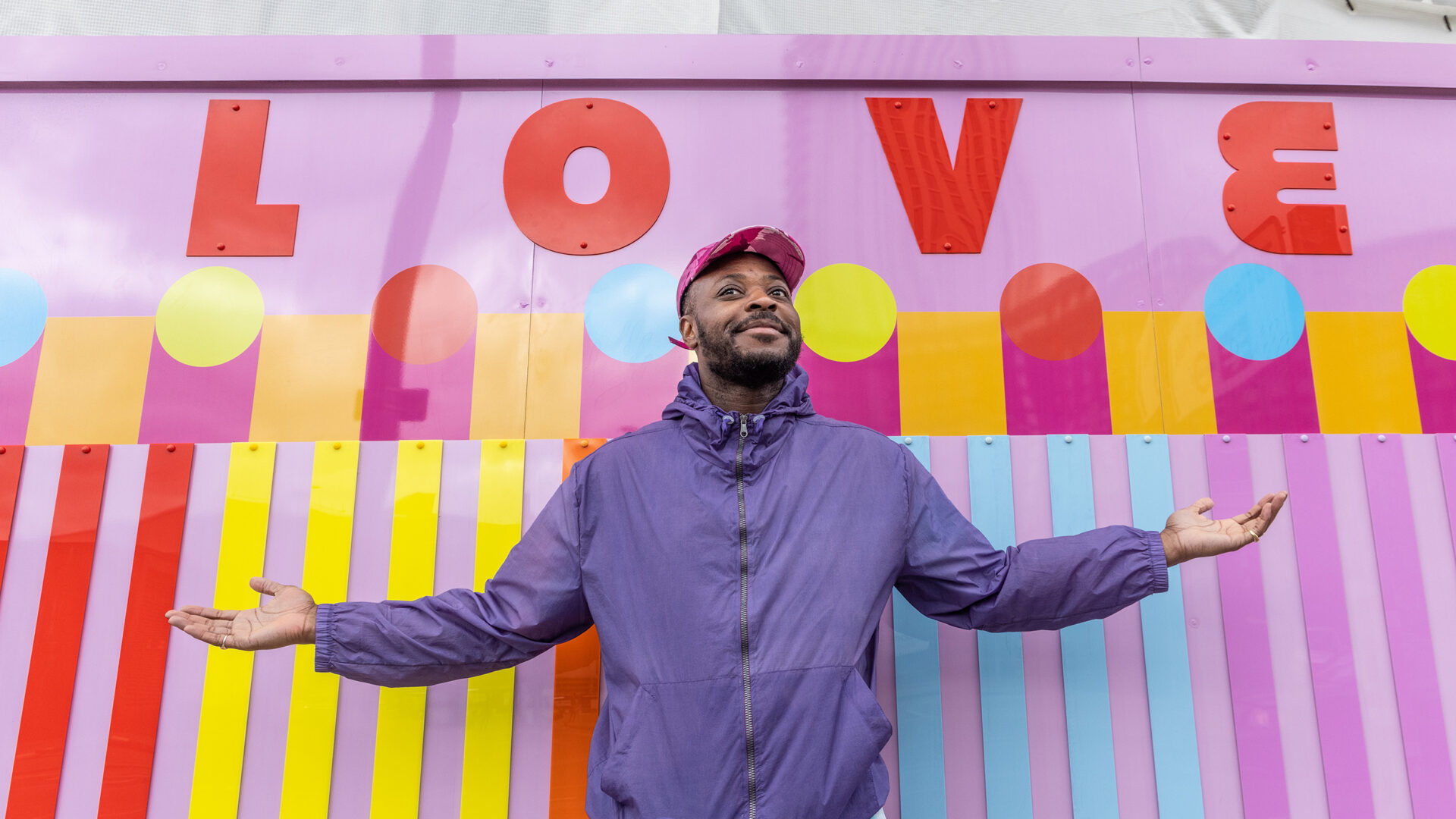 Artist in Residence Yinka Ilori with artwork at Heart of Hale