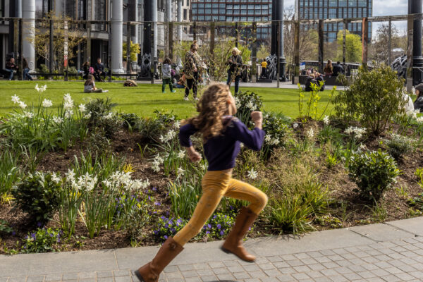 Girl running at Gasholder Park, King's Cross